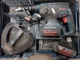 a box with tools in it sitting on the floor