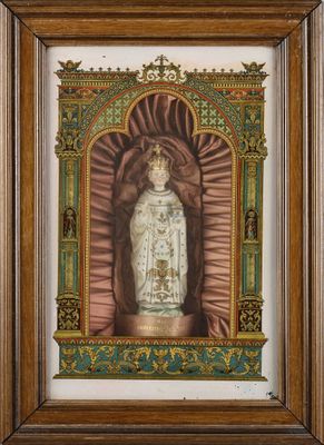 a painting of a statue of the virgin of guadalupe in a wooden frame
