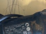 a close up of a motor bike with a motorbike in the background