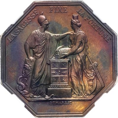 l'image d'une pièce de monnaie sur laquelle figurent une femme et un homme