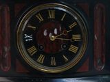 a clock that is sitting on top of a table