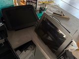 a microwave sitting on top of a counter next to a microwave oven