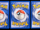 three cards with a picture of a pokemon figure on them