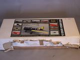 a cardboard box with a picture of a plane on it