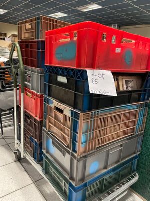 many crates stacked on top of each other in a store