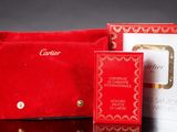 a close up of a red purse with a red card case