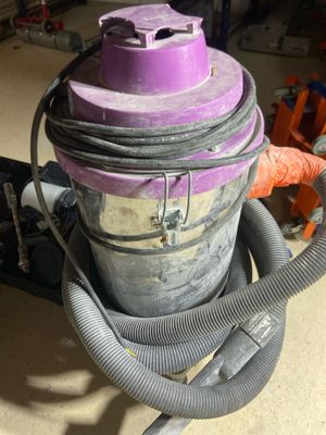 a vacuum that is sitting in the garage