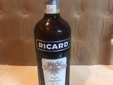 a bottle of wine that is sitting on a table