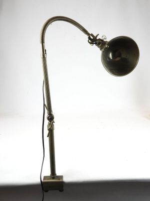 a lamp that is sitting on a table with a white background