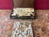 a suitcase full of toothbrushes and toothpaste on a table