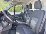 a view of the inside of a van with the driver ' s seat up