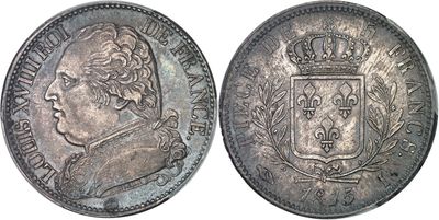 a close up of a coin with a crown on top of it