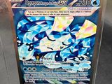 a close up of a box of pokemon cards on a table
