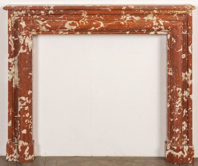 an image of a fireplace with a white wall and brown paint on it