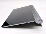 a close up of a laptop on a white surface