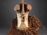 a close up of a mask on a piece of cloth