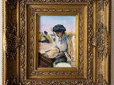 a painting of a woman reading a book in a gold frame