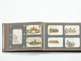 an open book with pictures of buildings and buildings on it
