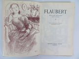 un livre ouvert sur lequel figure le dessin d'une femme assise sur une chaise