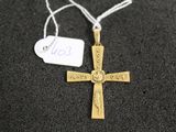 gold plated cross with a price tag attached to it