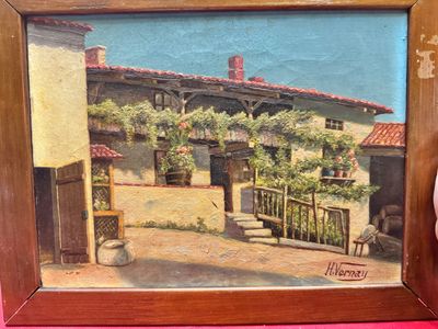 une photo d'un tableau représentant une maison, dans un cadre