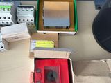 many boxes of electronic equipment sitting on a desk