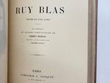 an open book with a picture of a man on it