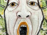 a picture of a ceramic sculpture of a woman ' s face with her mouth open