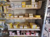 many boxes of fixations on the shelves in the store