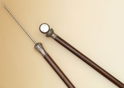 2 CANNES à système - L'une en bois exotique avec pommeau Mil… - Photo 1