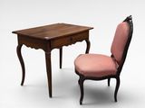 a small table with a chair next to it on a white background
