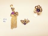 three gold and amethorate earrings and a gold and amethorate earring