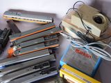 many different types of toy trains on the table