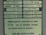 a sign on the side of a machine indicating the time