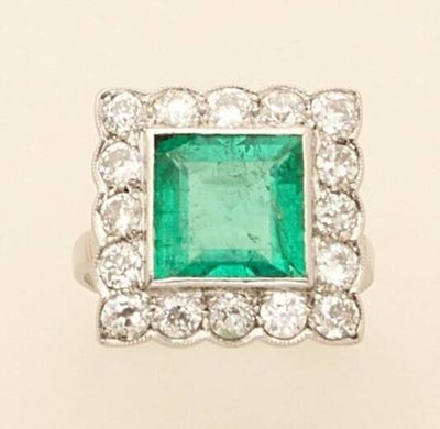 an emerald and diamond ring