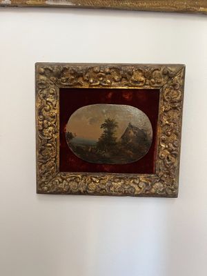 a picture of a painting hanging on a wall in a room
