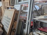 several pieces of wood are stacked up in a room