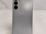 the back of a silver samsung s20 with two camera lenses on it