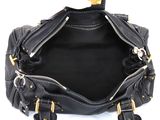 the inside of a black handbag with a zipper on it