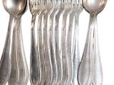 a lot of silver spoons and spoon spoons on the table