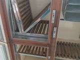 a chair that is sitting inside of a cabinet