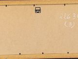 a picture of a wooden box with writing on it