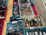 a lot of glasses on display in a store
