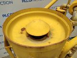 a yellow fire hydrant with a yellow cap on top of it