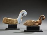 two pieces of art that are sitting on top of each other