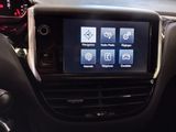 a picture of a car dashboard with a touch screen