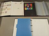 two open notebooks sitting on a table next to each other