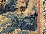 a picture of a tapestry with a picture of a man and a woman on it
