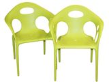pair of lime green plastic chairs with holes on the back
