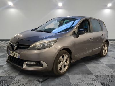 a picture of a grey car parked in a showroom